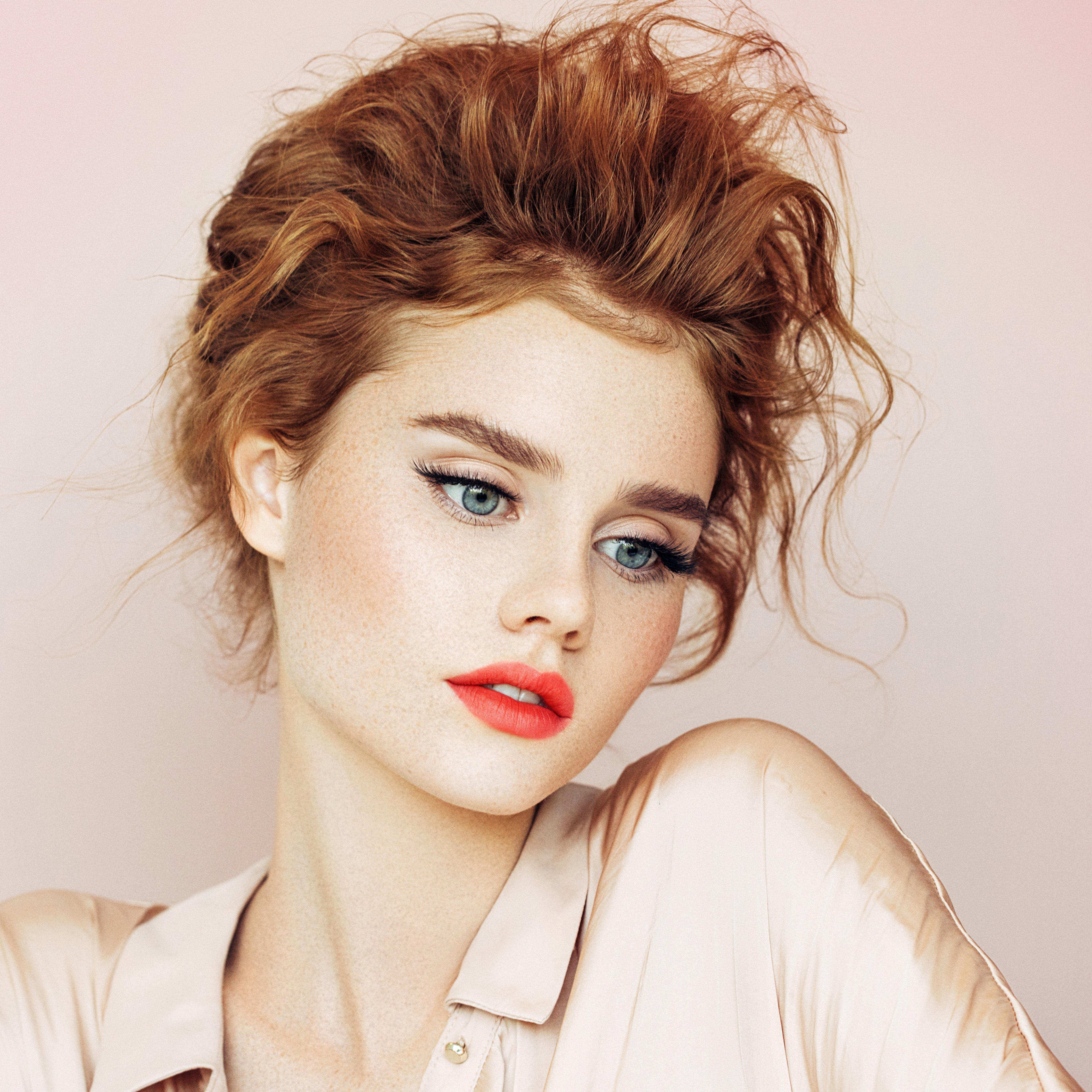 Model wearing 08 Coral Dawn - Natural Lipstick