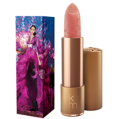 Nude Lipstick with decorative packaging featuring a character in a purple outfit.