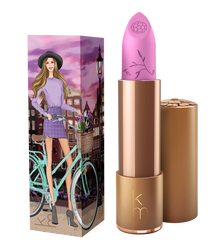 Lilac lipstick in a gold cannister and it's box. 