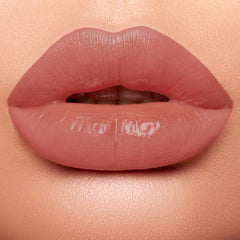 lips wearing nude lipstick 