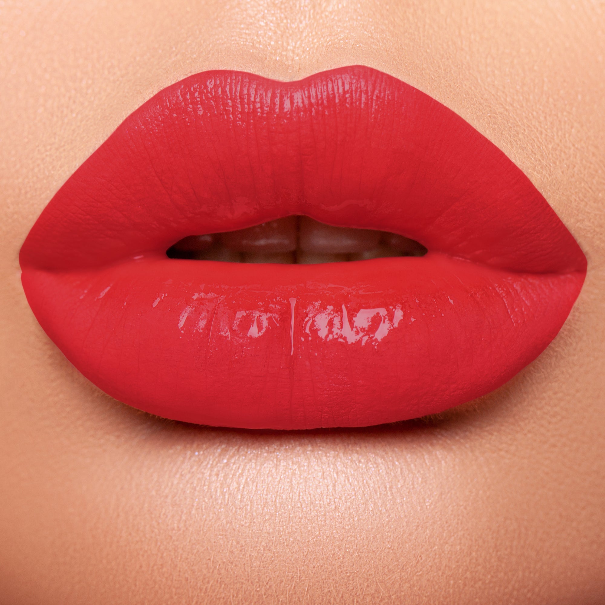 lips wearing all natural red shimmer lipstick