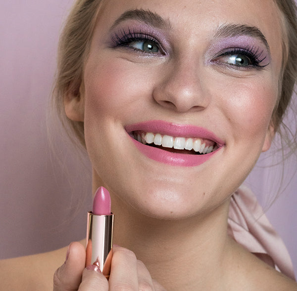Model wearing Lavender Laughter lipstick