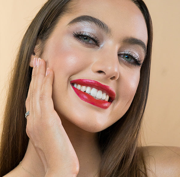 Model wearing #20 True Love natural lipstick